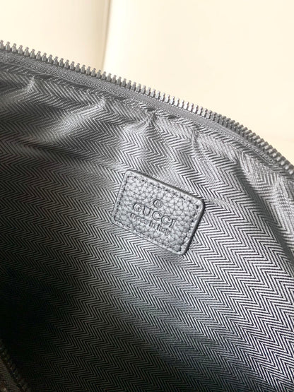 GG Leather embossing clutch bag 1825042909